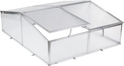 A greenhouse with a clear lid and white sides.