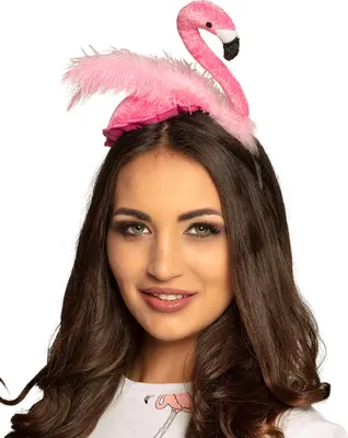 A woman wearing a flamingo headband.