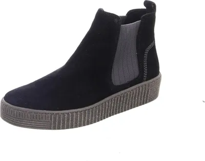 A single black Chelsea boot is shown against a white background.