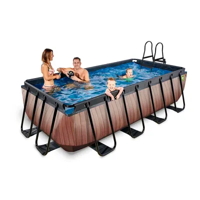 A family is enjoying a rectangular above-ground swimming pool with a wood-grain exterior.
