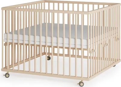 A wooden playpen with a mattress inside, shown from a diagonal angle.