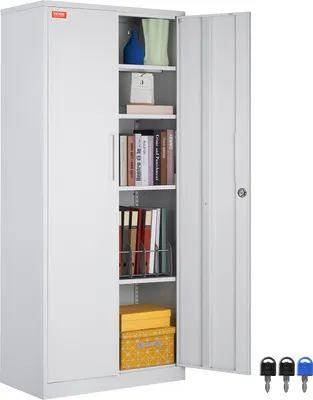 A white metal filing cabinet with its right door open, revealing shelves with books, decorative items, and boxes. Three keys are shown in the bottom right corner.