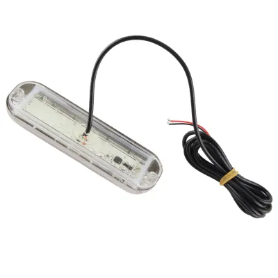 A single underwater boat light with a black wire attached, isolated on a white background.