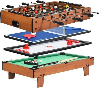 A multi-game table with four different game surfaces stacked on top of each other.