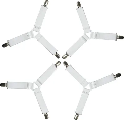 Four white bed sheet fasteners arranged in a star-like pattern against a white background.