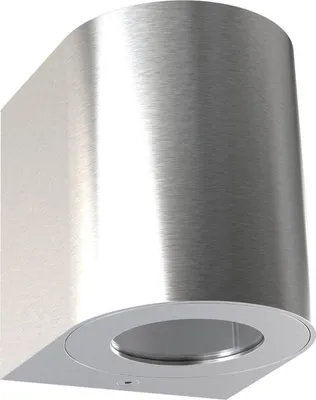 A modern, brushed metal wall lamp with a circular glass lens at the bottom.