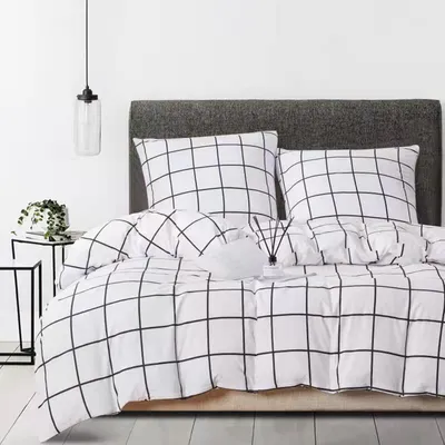 Immagine prodotto di Set di lenzuola in cotone a quadri, nero e bianco, composto da: lenzuolo da 135x200 cm e federa da 80x80 cm, con chiusura a zip