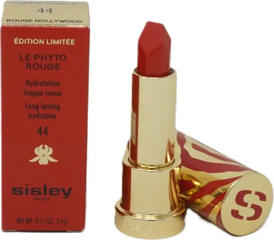 A red and gold lipstick with its packaging.
