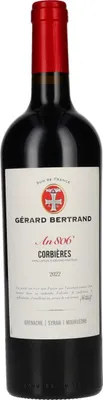 A bottle of red wine against a white background.