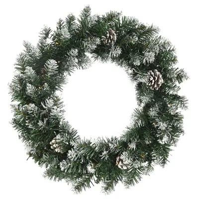 A Christmas wreath with pinecones and artificial snow.
