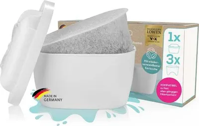 A water filter starter kit with a filter cartridge and filter bags, shown with packaging in the background.