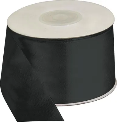 A roll of black satin ribbon on a white background.