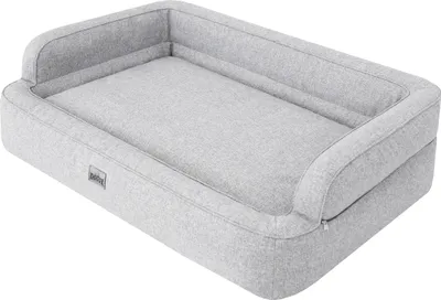 A light gray dog bed with raised sides is shown from a slightly elevated angle against a white background.