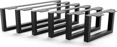 A set of five black metal table legs arranged diagonally on a white background.