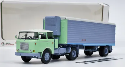 Produktbild von Skoda LIAZ 706 MTTN Ciągnik siodłowy z naczepą Alka N12CH - jasnozielony/szary MODIMIO 1:43