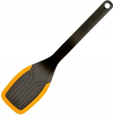 A black and orange spatula on a white background.