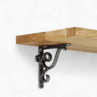 Regalwinkel Wandwinkel Stahlguss 105×105 mm Widderhörner-Motiv