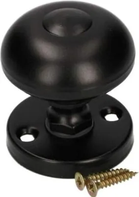 A black metal doorknob with a round rosette and two screws.