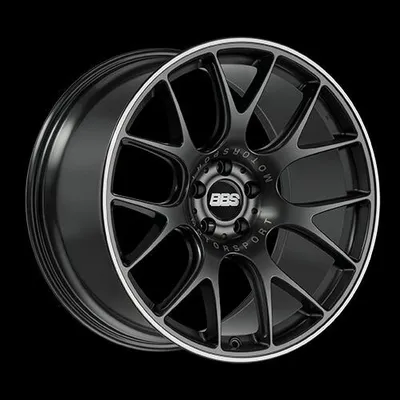 A black BBS alloy wheel with a silver rim, shown against a black background.