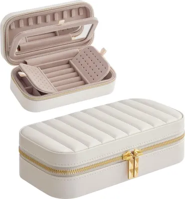 A jewelry box is shown open and closed against a white background.
