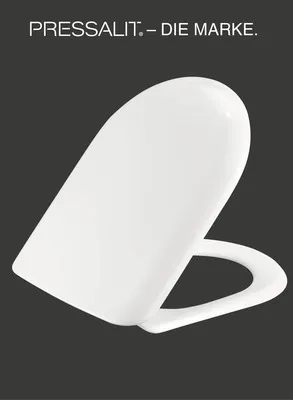 A white toilet seat with a lid is shown against a dark background.