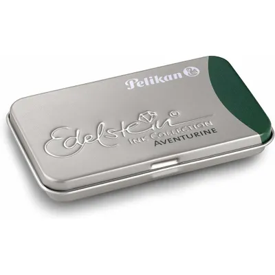 A silver tin box with green accents, embossed with the Pelikan Edelstein Ink Collection Aventurine logo.