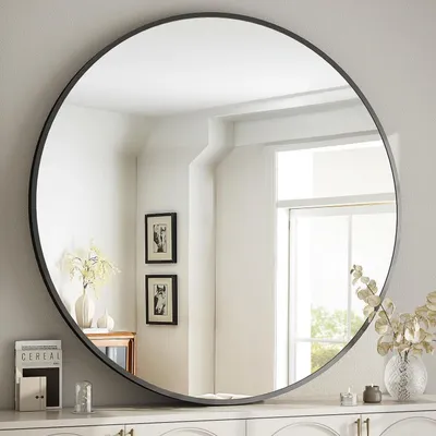 Productafbeelding van Spiegel in de vorm van een rund, 50 cm, zwart, met een aluminium frame. Breekvaste constructie, geschikt om op te hangen en tegen een muur te leunen