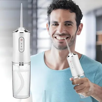 Produktbild von Prenosný bezdrôtový 350 g zubný irigátor, USB dobíjací ústny irigátor so 4 koncovkami na čistenie jazyka a ďasien - TOOTHCLEANSO