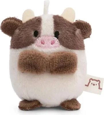 A small, plush toy cow with brown and white patches.