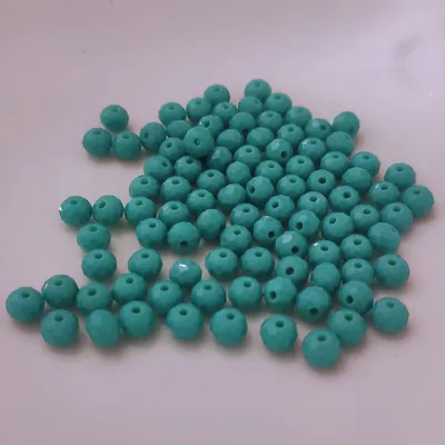 Produktbild von Glasperlen - Typ 'Facettiert' - 60 Stück - 10 mm - Türkis hell matt