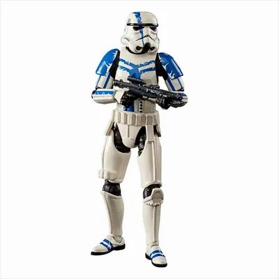 A Star Wars Stormtrooper action figure standing and holding a rifle.