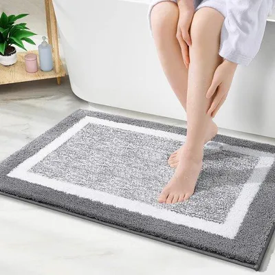 Immagine prodotto di Tappetino antiscivolo per doccia Unyqoos® 50 x 75 cm – tappetino da bagno in microfibra morbida e assorbente, con circa 2 cm di pelo e base in gomma antiscivolo, colore grigio