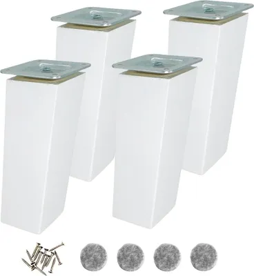 Four white furniture legs with silver mounting plates and a pile of screws and felt pads.