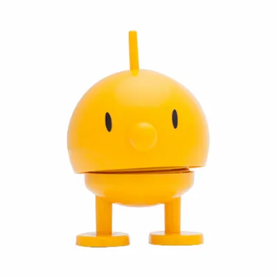 A yellow Hoptimist Soft Bumble toy is shown against a white background.