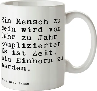 Produktbild von Mr. & Mrs. Panda Teetasse Ein Mensch zu sein... - Weiß - Geschenk, Unicorn, Regenbogen, witzig, schöne tasse, Keramiktasse, Liebe, Kaffeebecher, Lustige Sprüche, Realität