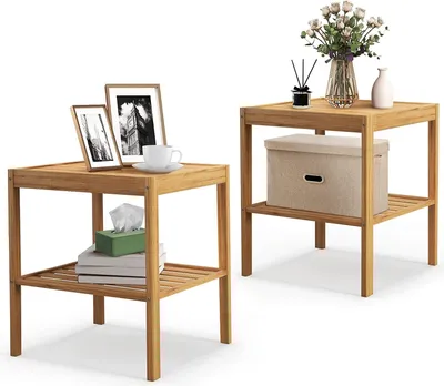 Two wooden side tables are shown against a white background. The table on the left has picture frames, a cup, and tissues on it. The table on the right has a decorative vase with flowers, a diffuser, and a storage box.