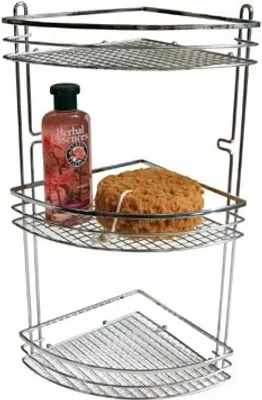 A chrome corner shower caddy with three shelves, holding a bottle of Herbal Essences shampoo and a sponge.