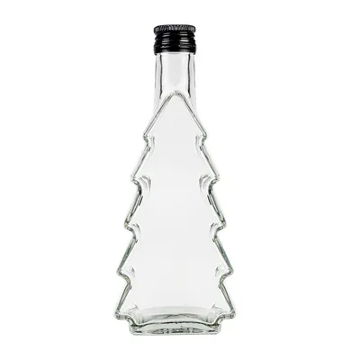 A clear glass bottle shaped like a Christmas tree with a black screw-on cap, isolated on a white background.