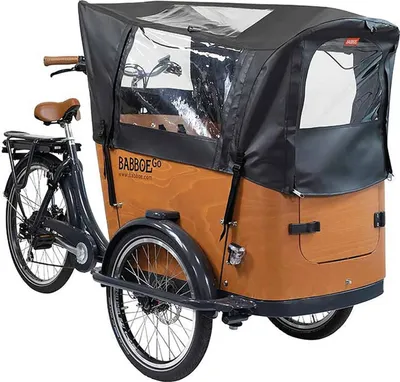 A cargo bike with a cover.