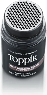 A close-up studio shot of a Toppik Hair Building Fibers bottle.
