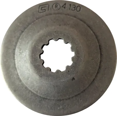 A single metal disc with a toothed inner hole, shown against a white background.
