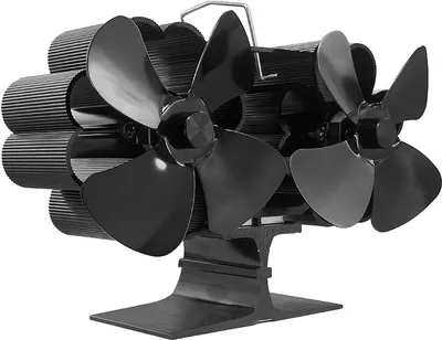 A black stove fan with multiple blades, designed to sit on top of a wood-burning stove.