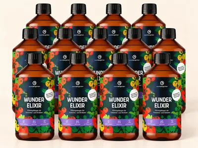 Produktbild von 12x Flüssigdünger mit 15 % Pflanzenkohle 500 ml - Wundergarten Wunderelixir Organischer Tomaten- & Kräuterdünger für Gemüse, Hochbeet, Balkon & Garten