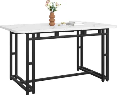 A marble-top dining table with black metal legs.