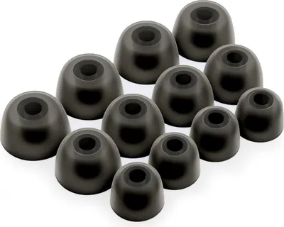 A collection of black silicone ear tips for headphones.