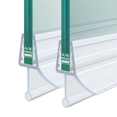Close-up view of two shower door seals attached to glass panels.