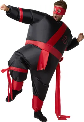 A person wearing an inflatable ninja costume.