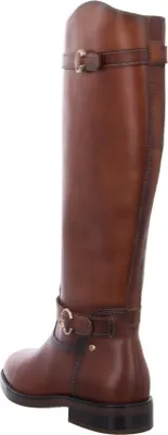 A side view of a brown leather boot.