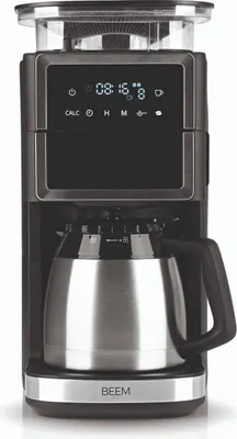 A front view of a black and silver coffee maker with a thermal carafe.