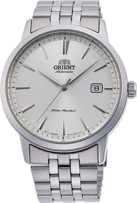 A close-up studio shot of a silver Orient Bambino automatic watch with a white dial, presented on a white background.